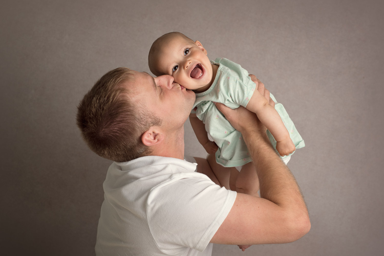 baby kiss from dad by siobhan kelly photography