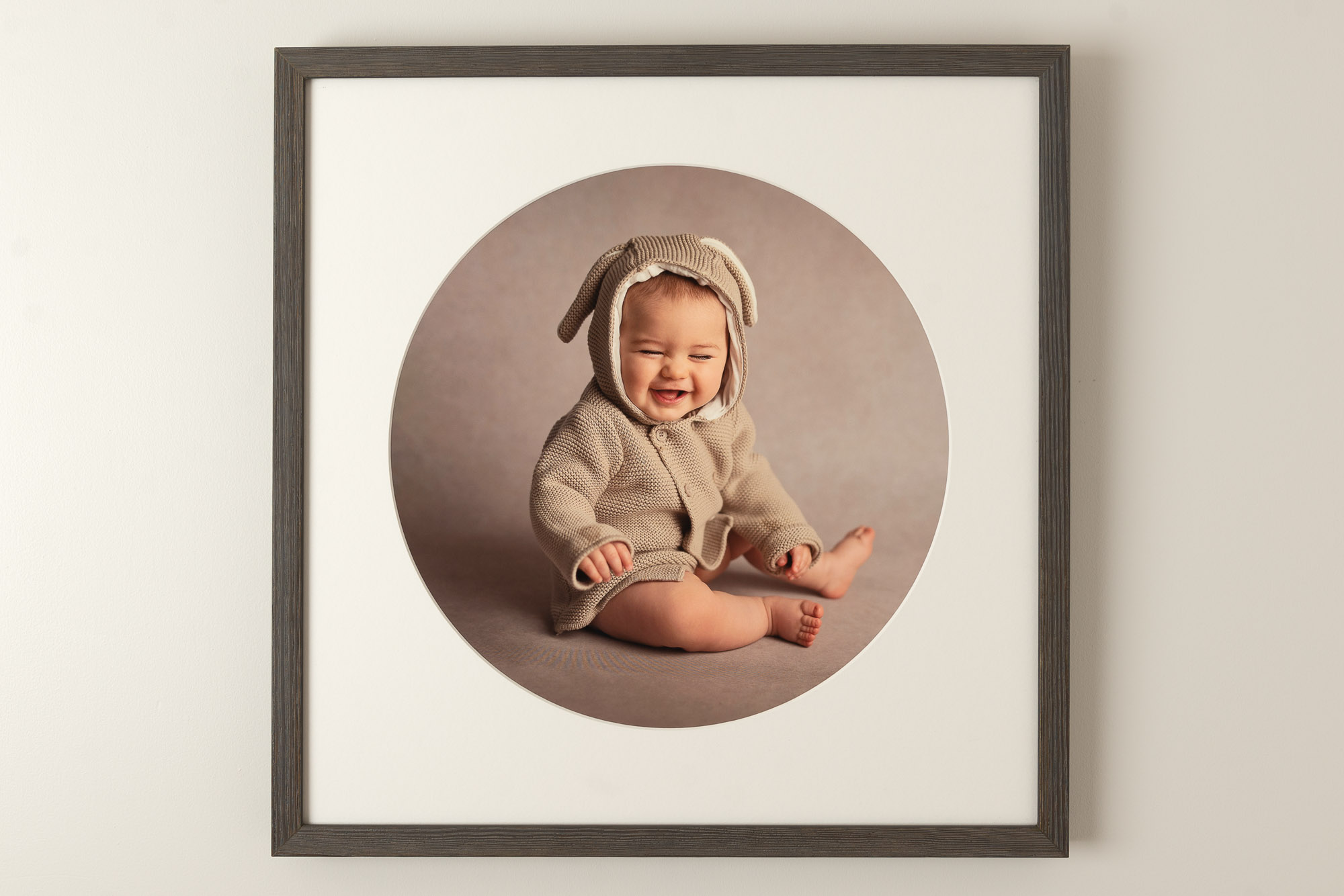 framed image of laughing baby