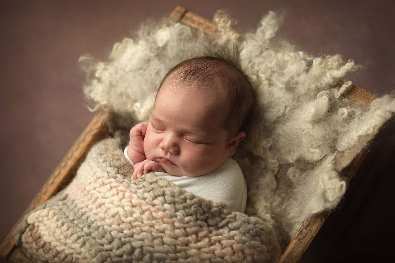 baby in box sleeping by siobhan kelly photography