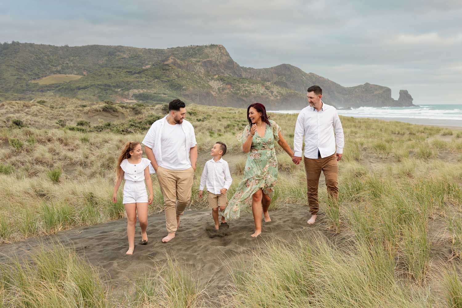 Auckland Family Photography 10 family on sand dunes by family photographer siobhan kelly